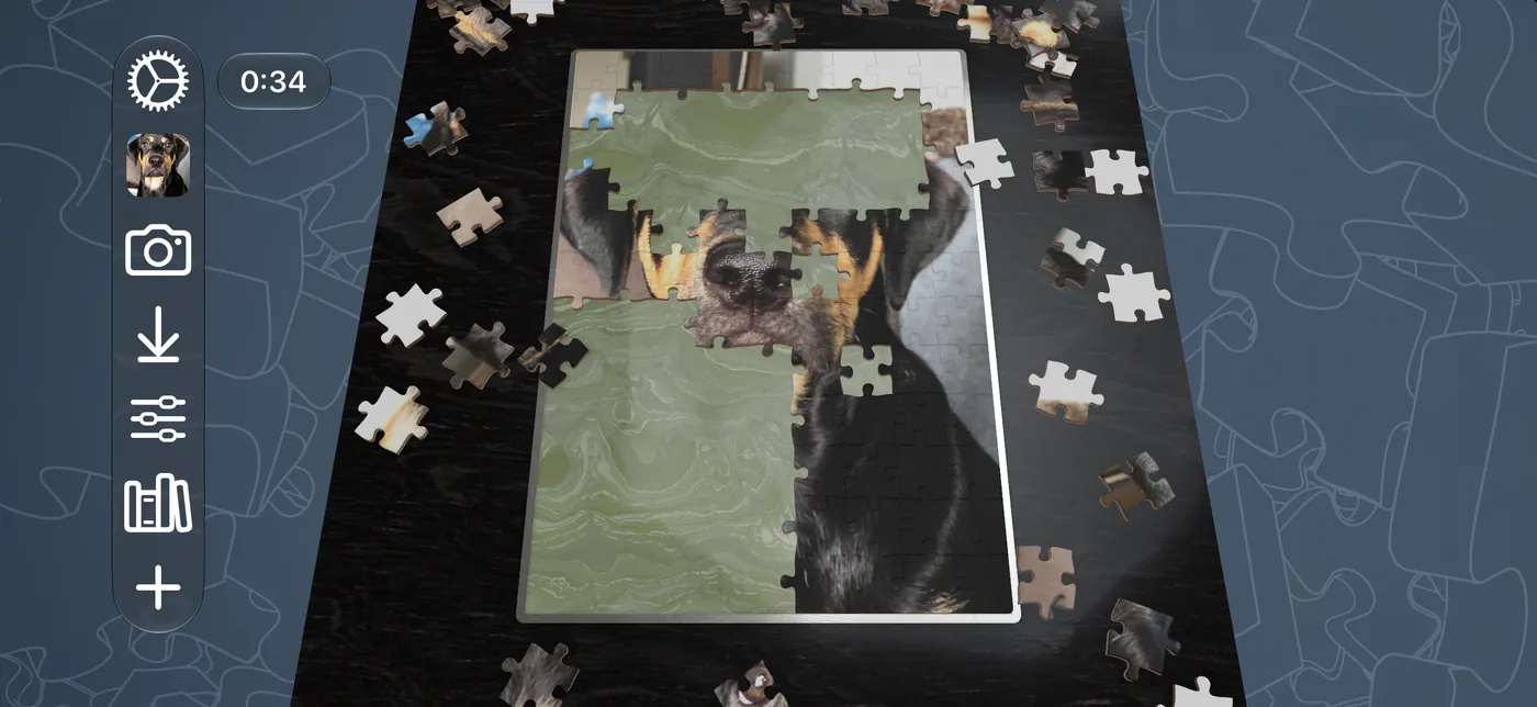 A puzzle of a dog partly assembled on iPhone in landscape, on a dark board