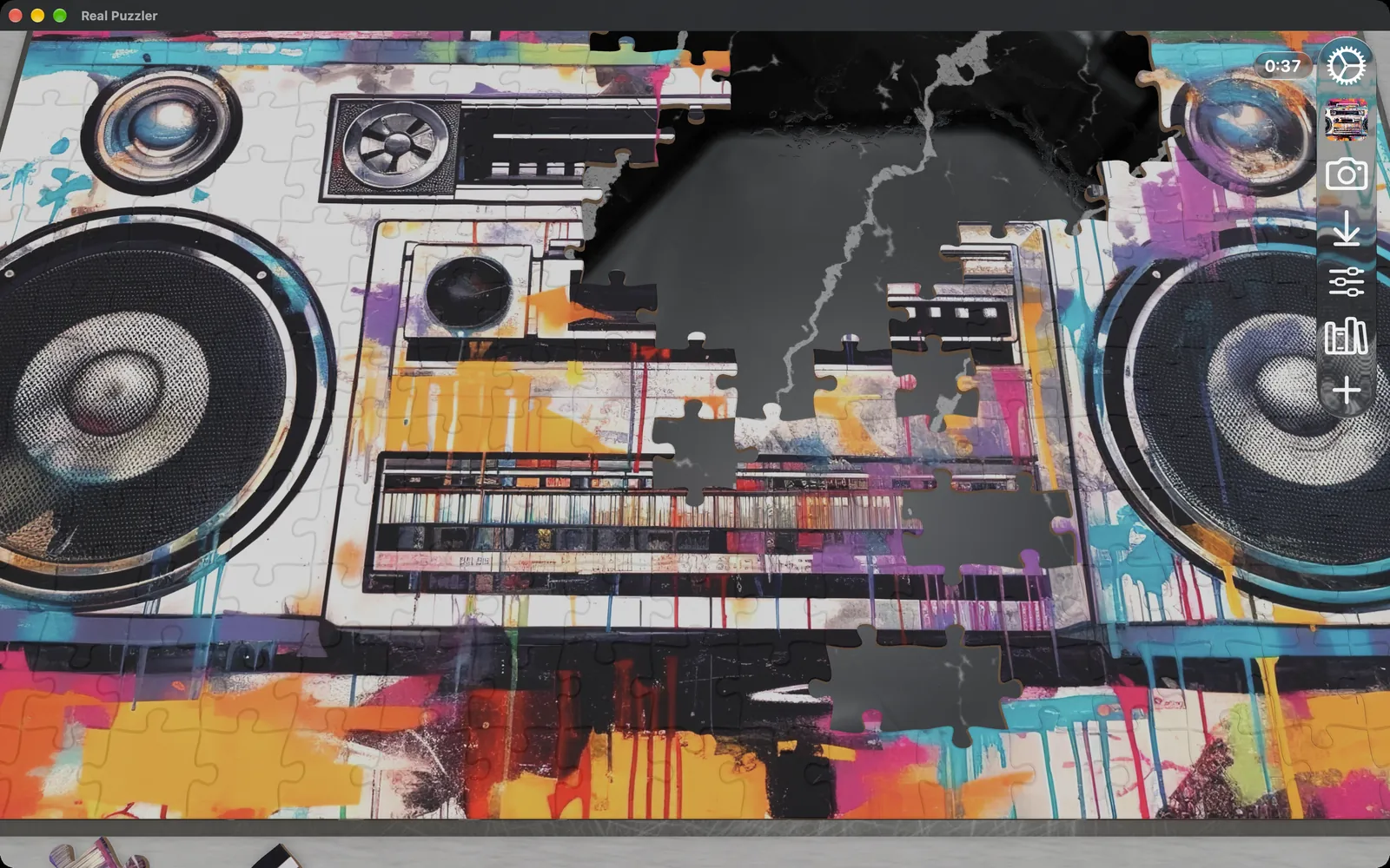 A large boombox puzzle being assembled in a Mac window, with the toolbar on the right