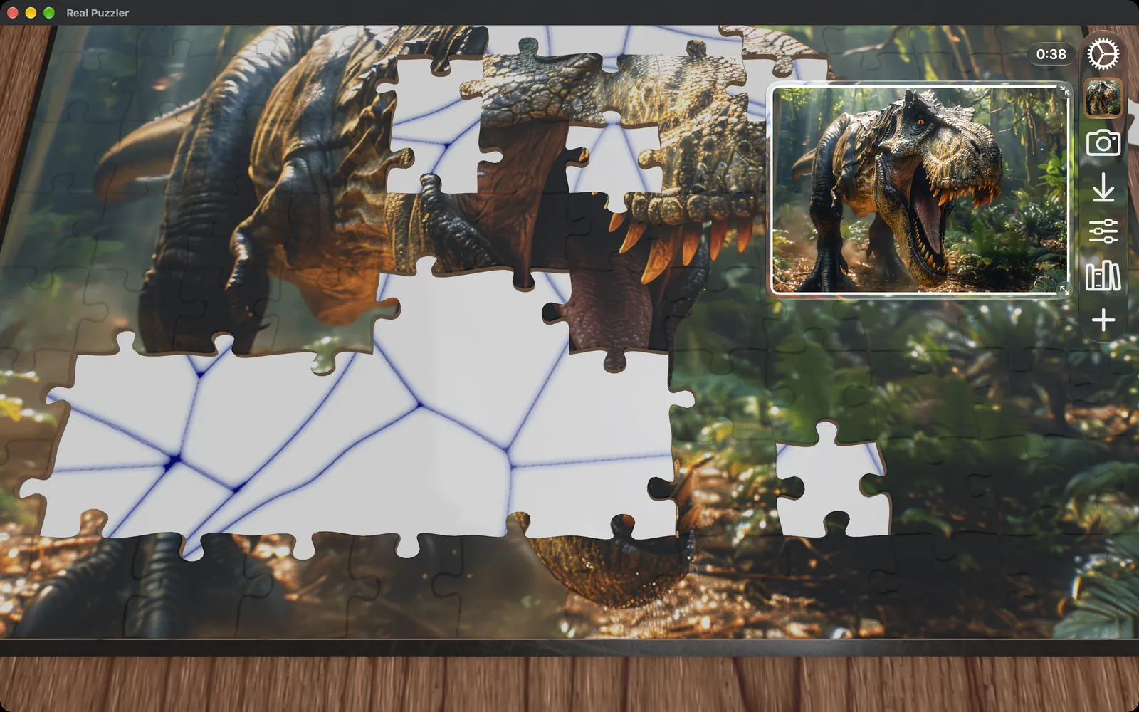 A dinosaur puzzle partly assembled in a Mac window, with a small preview of the picture in the corner